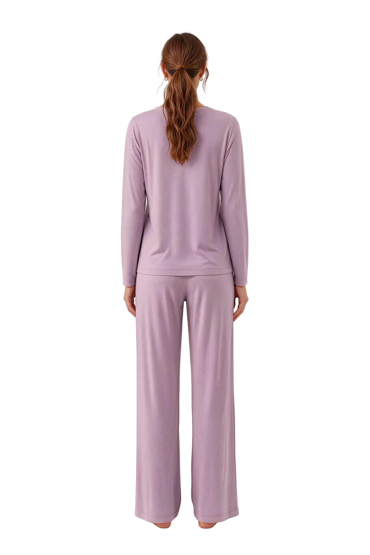 A woman viewed from the back wearing a matching long-sleeve top and wide-leg pants set in a soft dusty lavender color, standing against a plain white studio background.